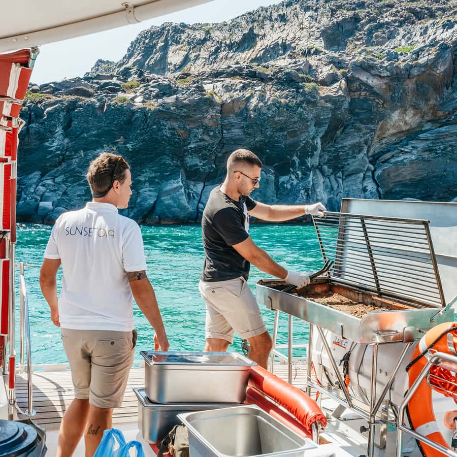 Santorini Catamaran Tour with BBQ Dinner Drinks and Music 