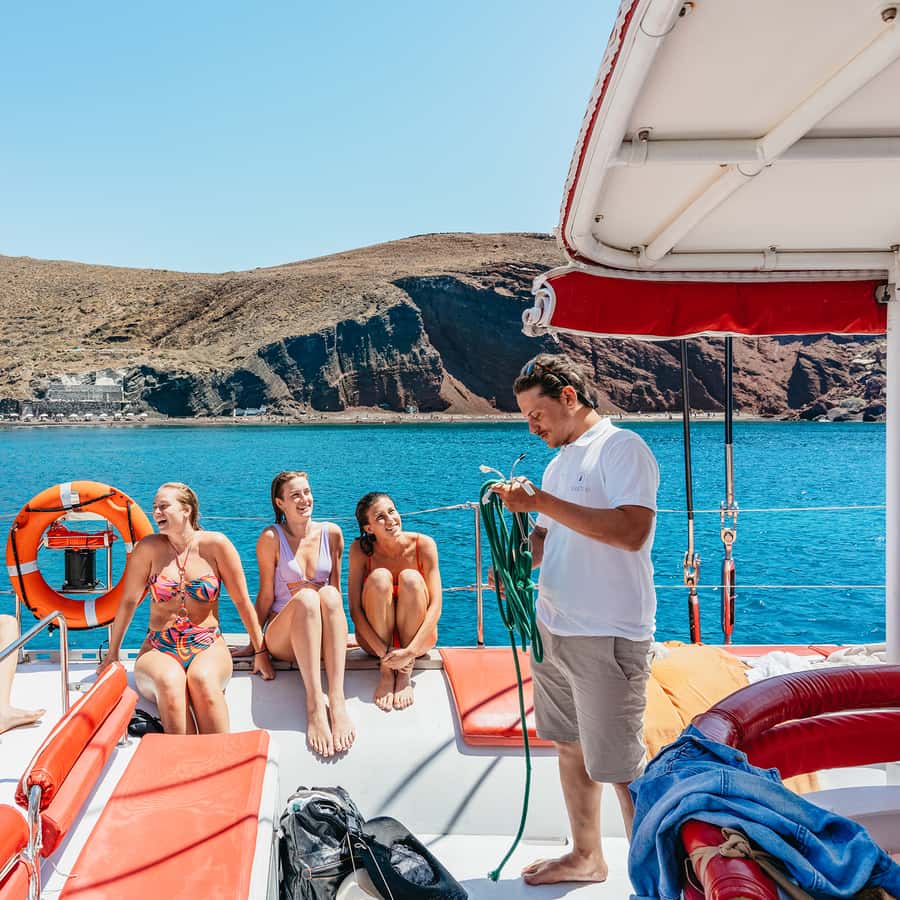 Santorini Catamaran Tour with BBQ Dinner Drinks and Music 