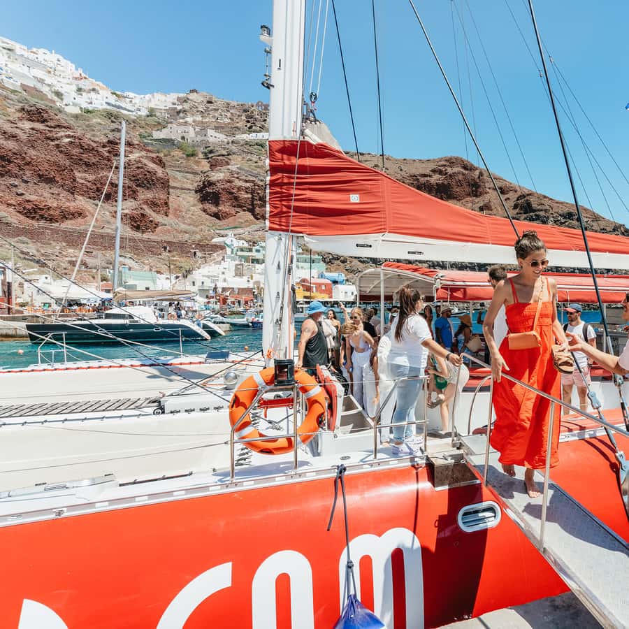 Santorini Catamaran Tour with BBQ Dinner Drinks and Music 