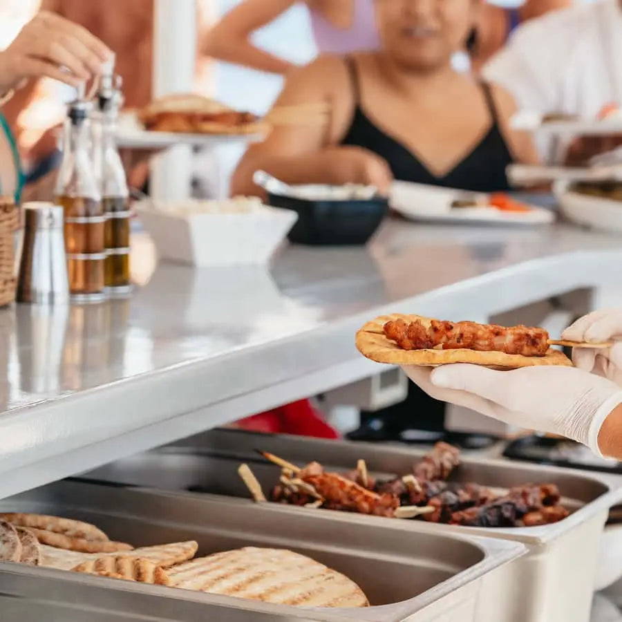 Santorini Catamaran Tour with BBQ Dinner Drinks and Music 