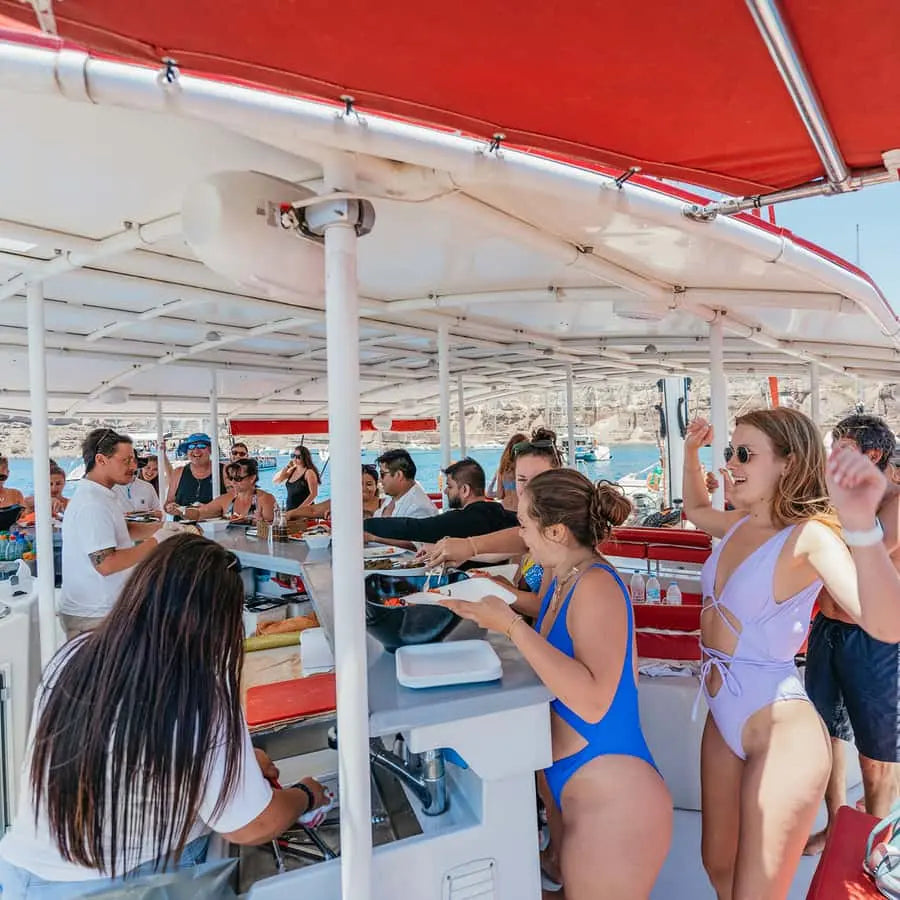 Santorini Catamaran Tour with BBQ Dinner Drinks and Music 