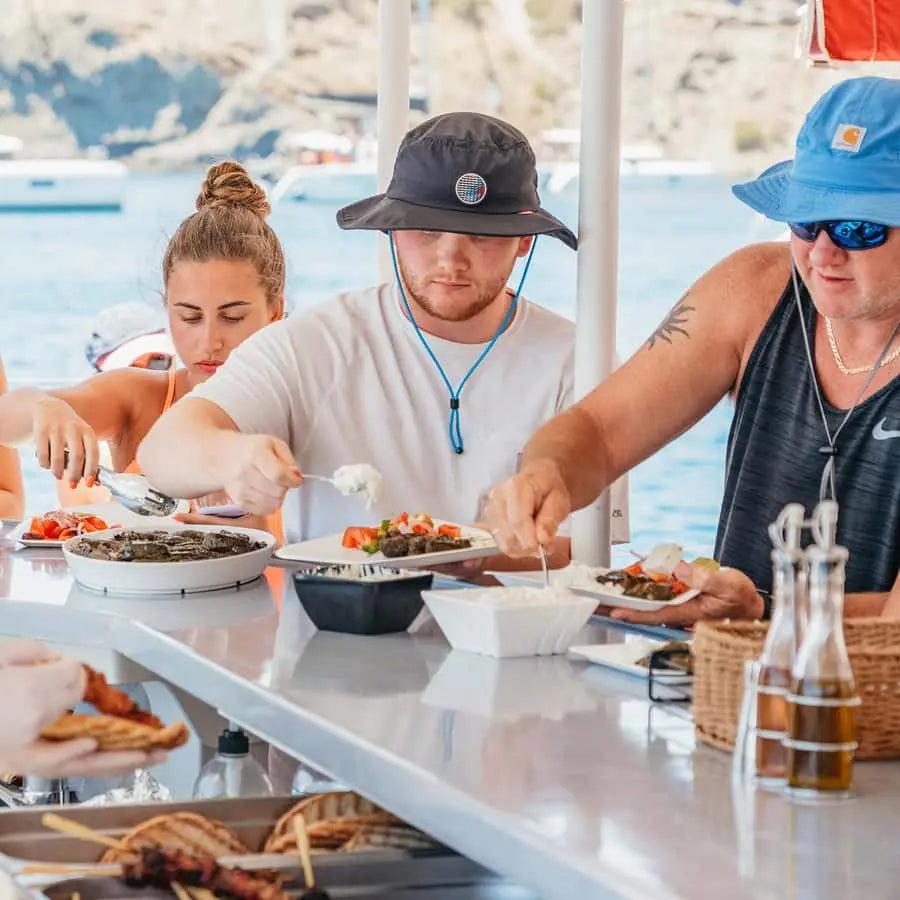 Santorini Catamaran Tour with BBQ Dinner Drinks and Music 