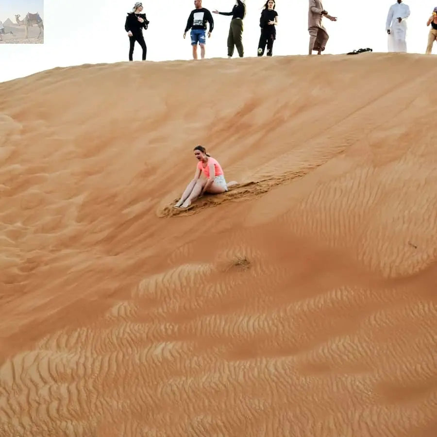 Dubai Red Dune Safari Quad Bike Camel Ride BBQ Dinner 