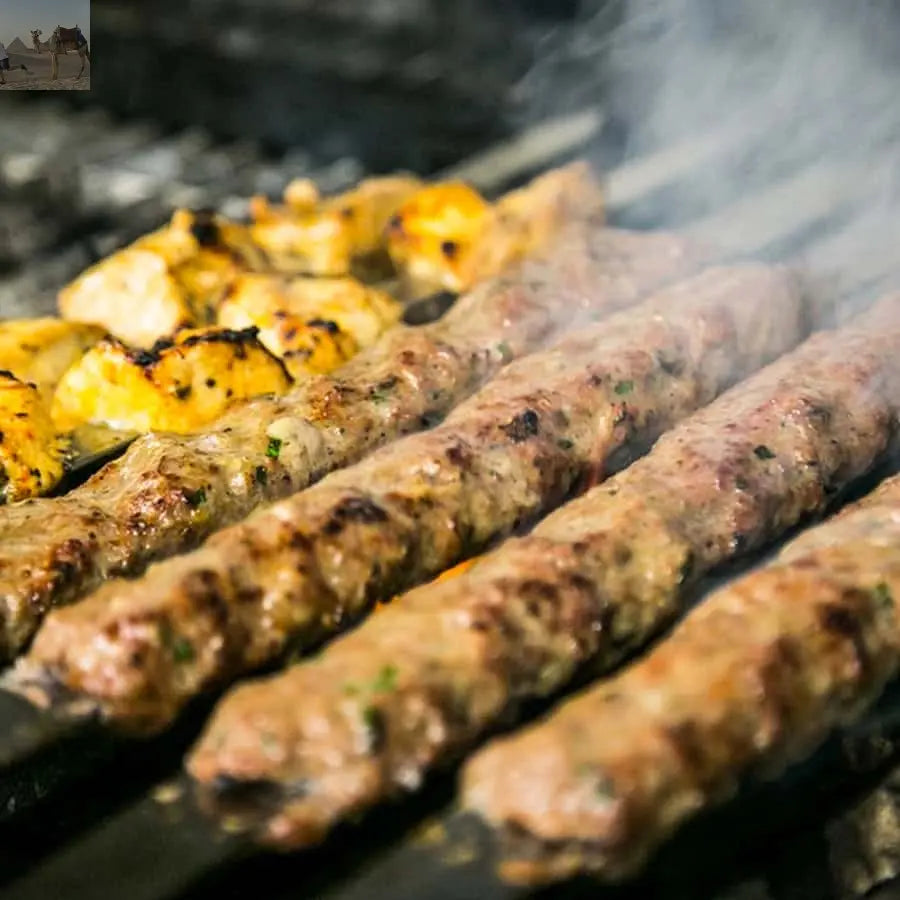 Dubai Red Dune Safari Quad Bike Camel Ride BBQ Dinner 