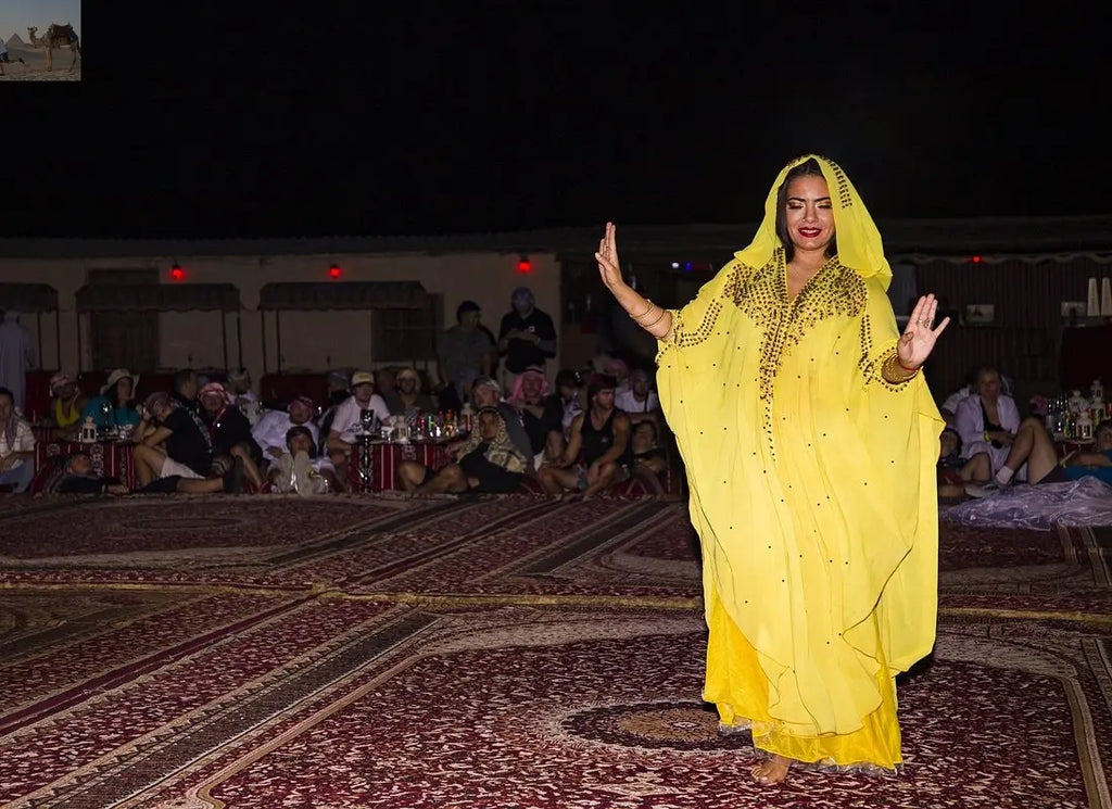 Dubai desert at sunset with a camel ride 