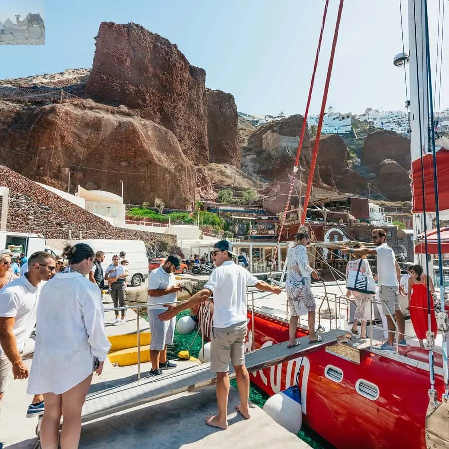 Santorini Catamaran Tour with BBQ Dinner Drinks and Music