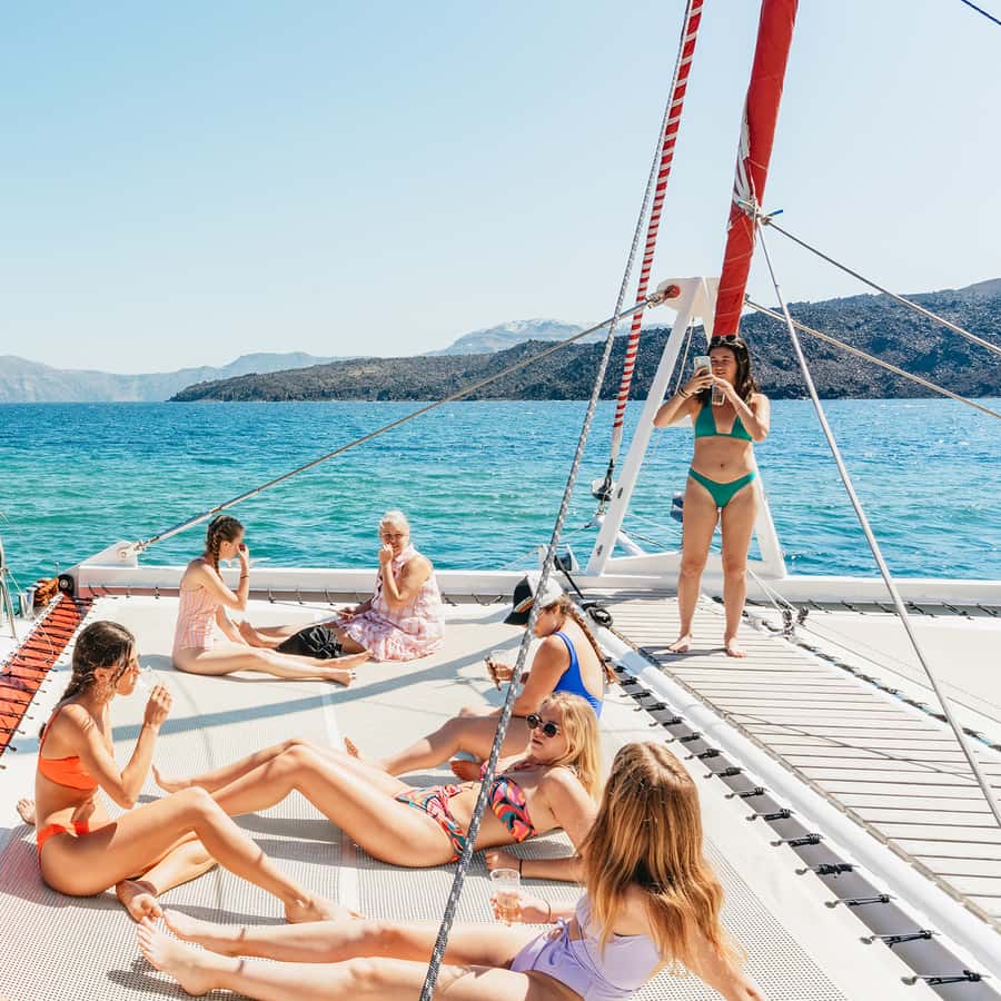 Santorini Catamaran Tour with BBQ Dinner Drinks and Music 