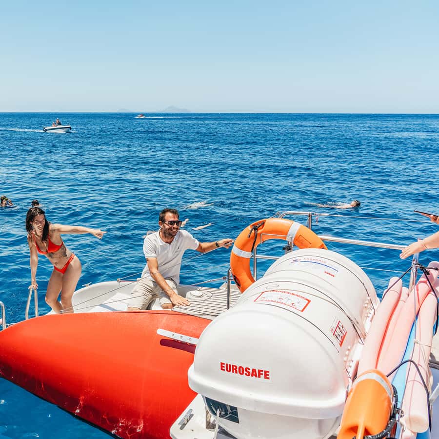 Santorini Catamaran Tour with BBQ Dinner Drinks and Music 